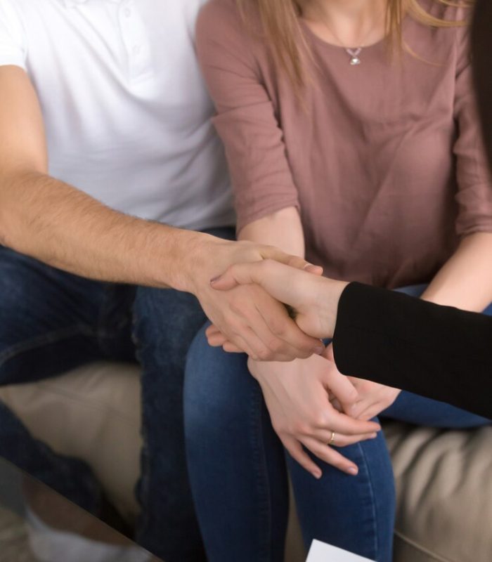 couple-shaking-hands-with-realtor-real-estate-home-renovation_1163-4184