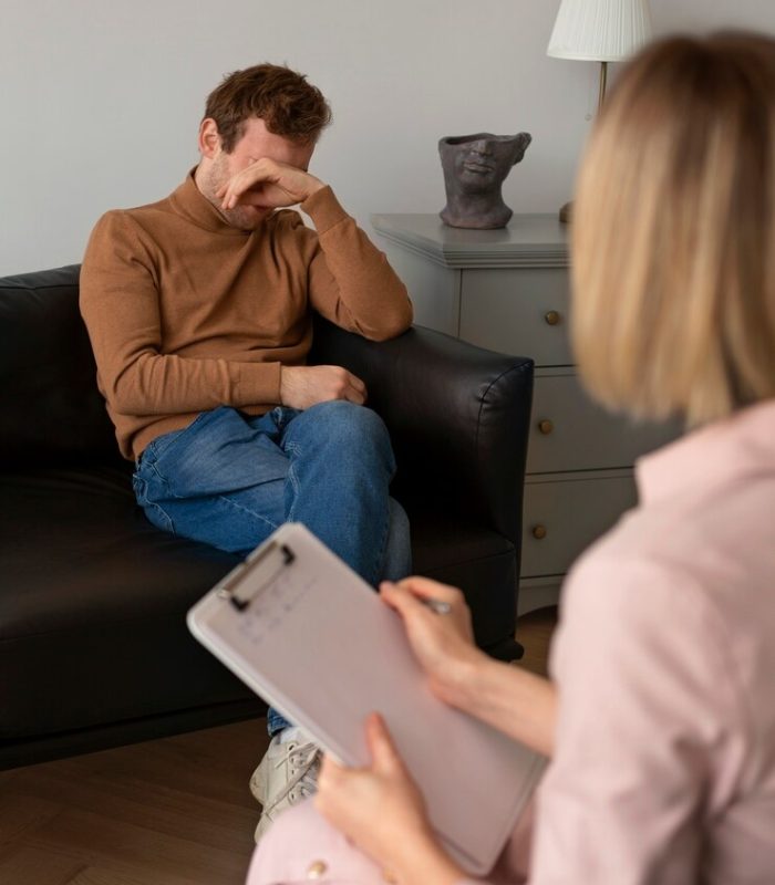 front-view-man-undergoing-therapy_23-2150229933